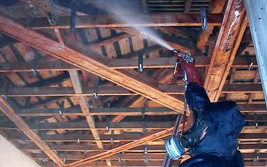Traitement des bois par pulverisation